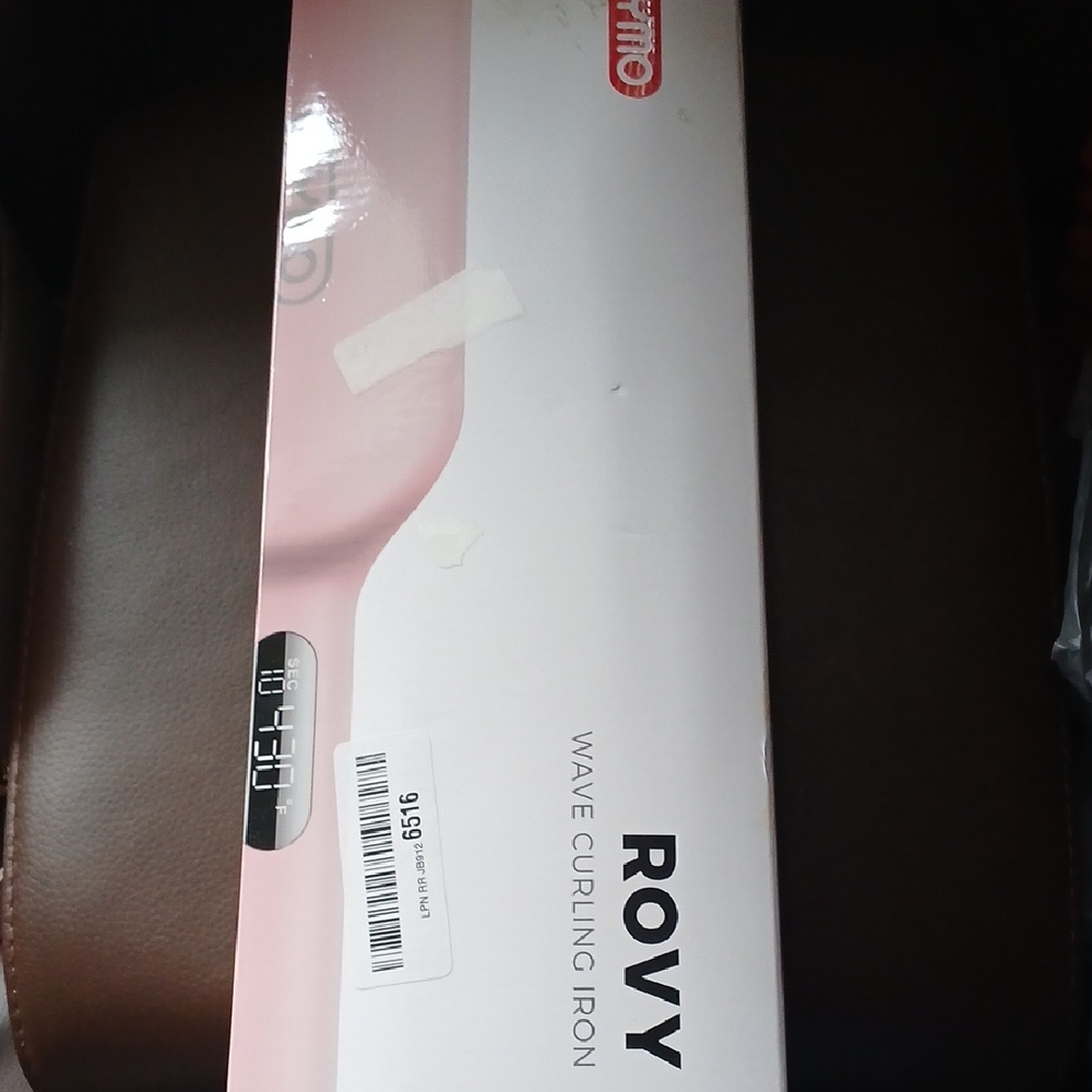 Rovy Pink Wave Curling Iron.     D